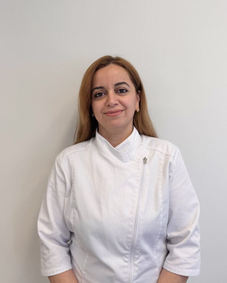 Hana Gulmohamad, dentist at Shiny Smile Dental Clinic